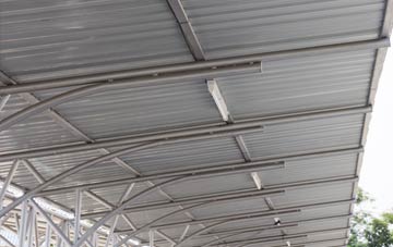 installing Woodspring Priory metal roofing